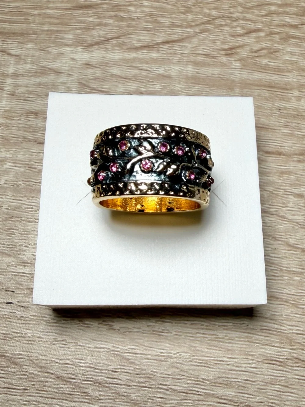Gold-Tone Wide Band Ring with Pink Accent Stones